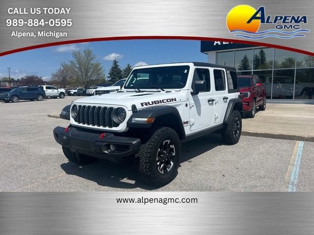 2025 Jeep Wrangler 4-Door Rubicon 4x4 in White — front three-quarter view