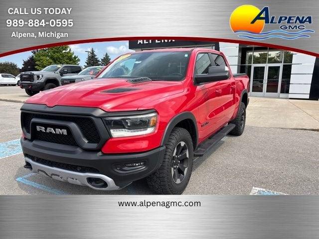 2019 RAM 1500 Rebel Crew Cab 4x4 5'7" Box in Red — front three-quarter view