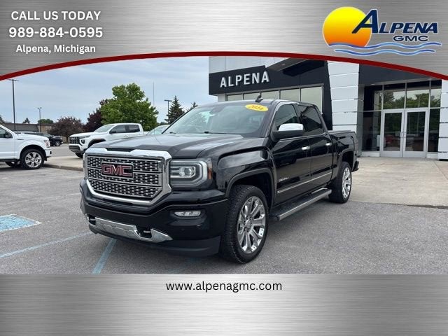 2016 GMC Sierra 1500 Denali in Onyx Black — front three-quarter view