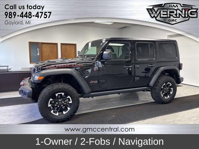2025 Jeep Wrangler Rubicon in Black — front three-quarter view
