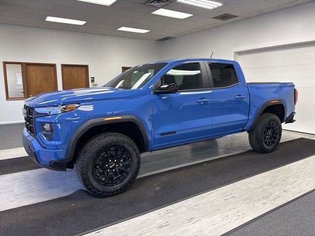 2026 GMC Canyon Elevation in Rapids Metallic — front three-quarter view