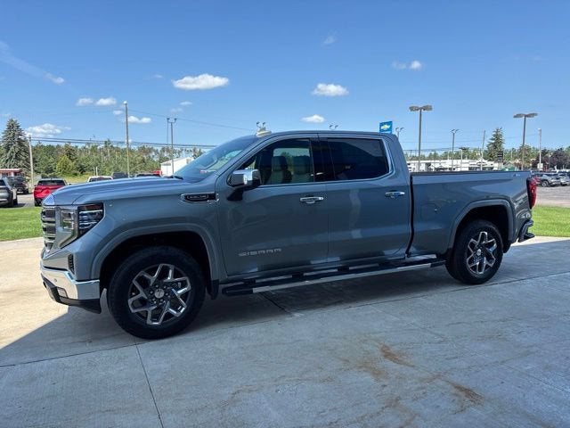 2026 GMC Sierra 1500 SLT in Sterling Metallic — front three-quarter view