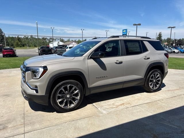 2026 GMC Terrain Elevation in Riverstone Metallic — front three-quarter view