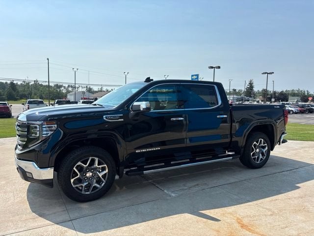 2026 GMC Sierra 1500 SLT in Onyx Black — front three-quarter view