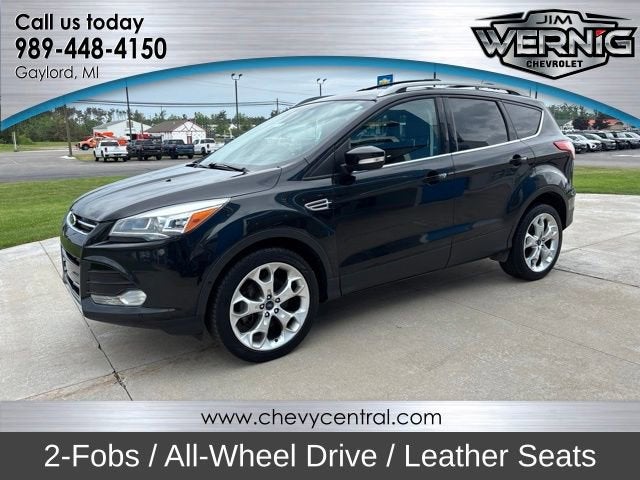 2014 Ford Escape Titanium in Black — front three-quarter view